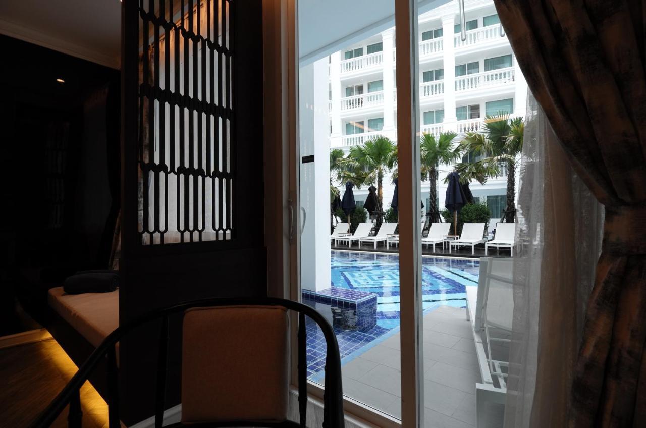 Moevenpick Myth Hotel Patong Phuket Exterior photo A view of the pool from a room at the hotel